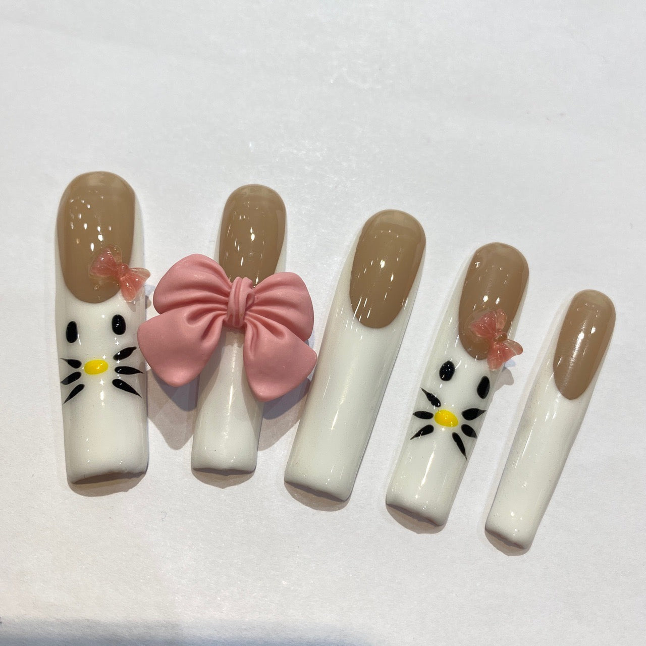 HELLOKITTY-TEN PIECES OF HANDCRAFTED EXTRA LONG PRESS ON NAIL