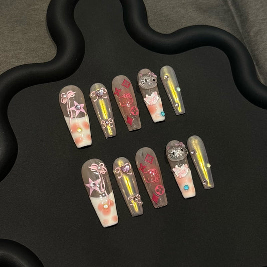 SANIO Y2K HELLO KITTY-TEN PIECES OF HANDCRAFTED PRESS ON NAIL