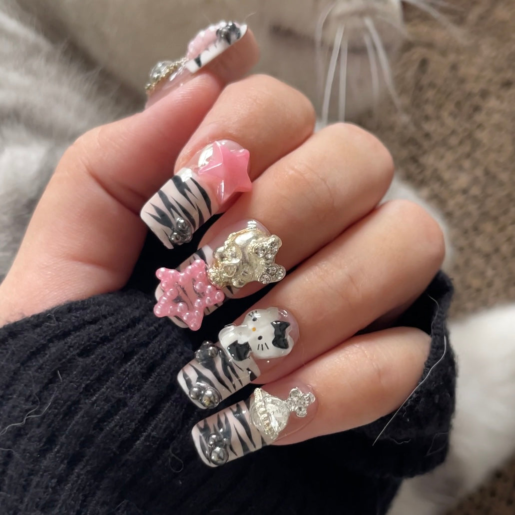 HELLO KITTY - TEN PIECES OF HANDCRAFTED PRESS ON NAIL